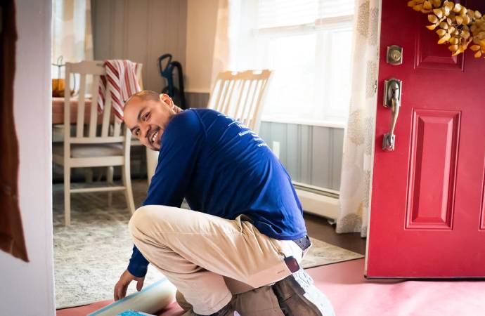 Waterproofing Technician Prepares Floor for Healthy Basement